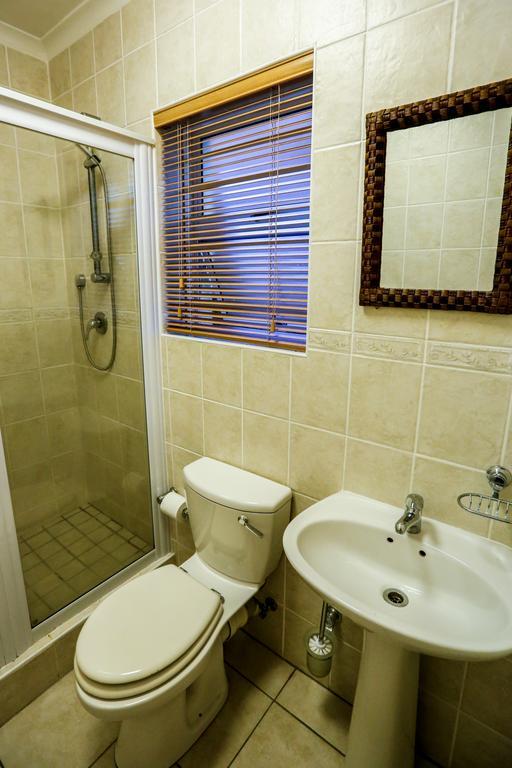 Secret Garden Guesthouse Bloubergstrand Kamer foto
