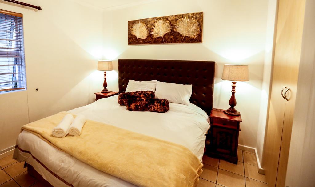 Secret Garden Guesthouse Bloubergstrand Kamer foto